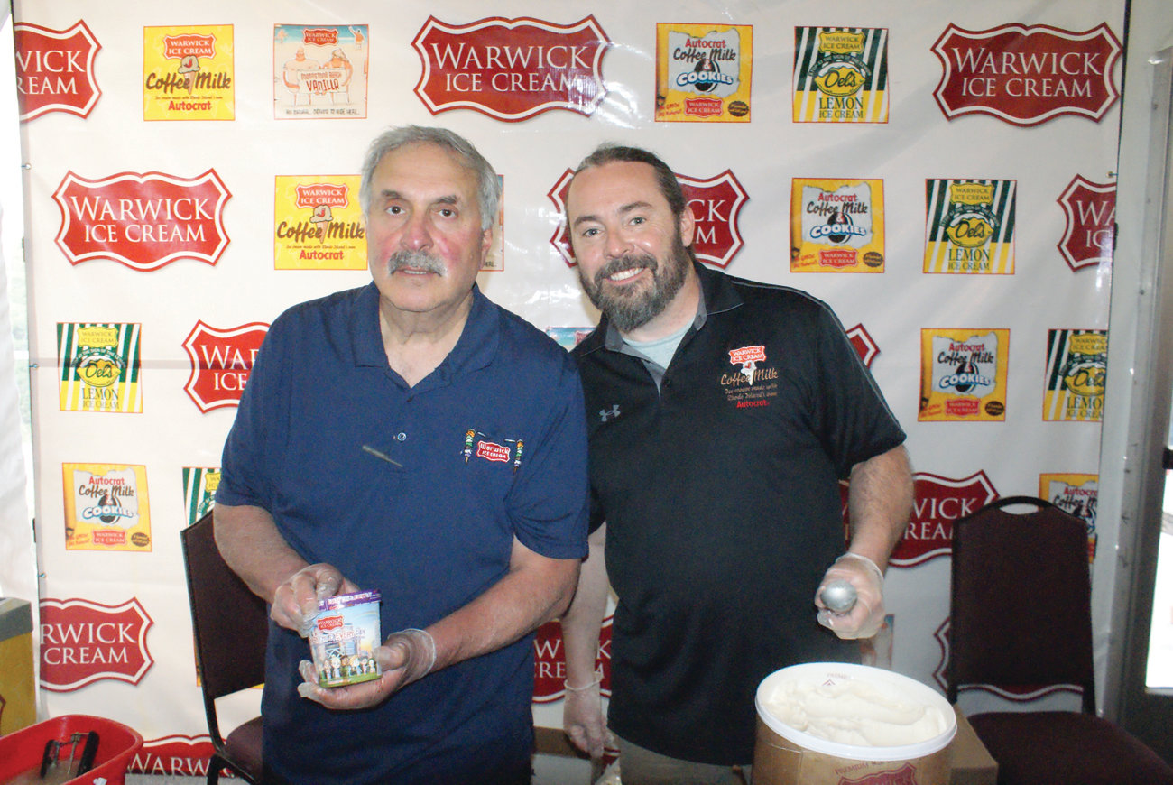 NEW FLAVOR: Fred Haddad and Gary Gaethofs from Warwick Ice Cream scoop their new “Moonstone Beach Vanilla” flavor during the “Taste of Rhode Island” event on June 5.